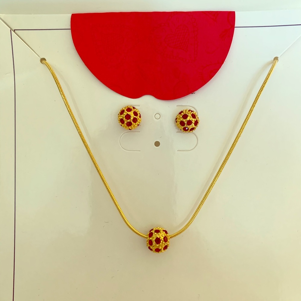 Gold and red stone necklace and earrings